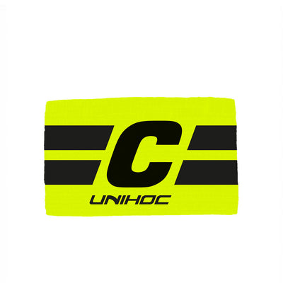 Unihoc sitt kapteinsbind er elastisk.  Farge: Gul/Sort
